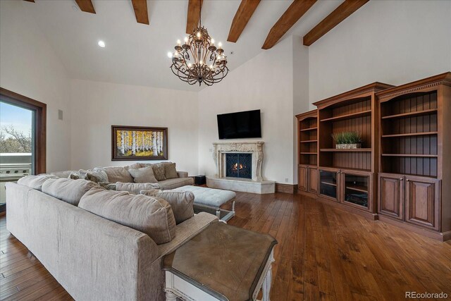 living room with a fireplace, high vaulted ceiling, dark wood finished floors, and beam ceiling