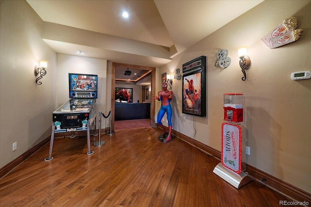 playroom with baseboards and hardwood / wood-style floors