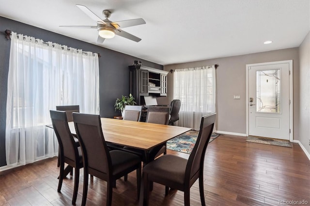 13818 Krameria St, Thornton, CO 80602 - dining room featuring ceiling fan, baseboards, and wood finished floors