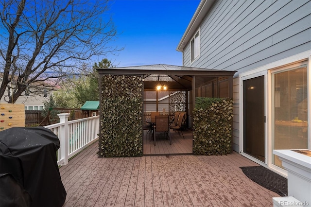 13818 Krameria St, Thornton, CO 80602 - view of patio / terrace with outdoor dining space, a deck, fence, a grill, and a gazebo