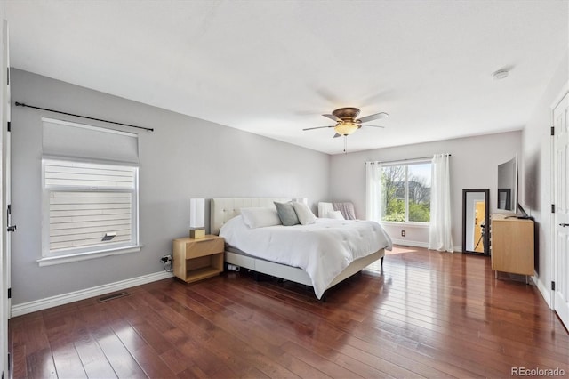 13818 Krameria St, Thornton, CO 80602 - bedroom featuring visible vents, dark wood-style flooring, baseboards, and ceiling fan