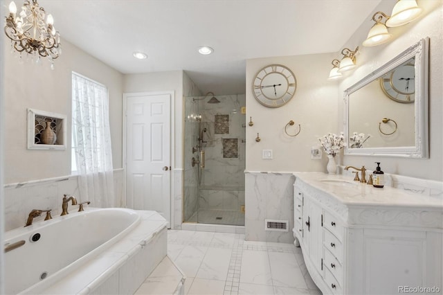 13818 Krameria St, Thornton, CO 80602 - bathroom featuring a garden tub, a stall shower, a wainscoted wall, vanity, and recessed lighting