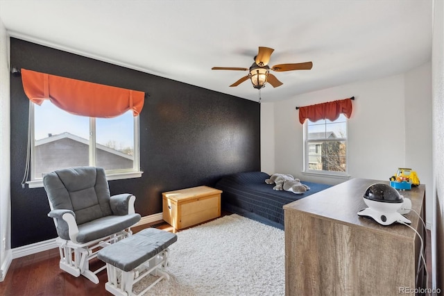 13818 Krameria St, Thornton, CO 80602 - bedroom with wood finished floors, baseboards, and ceiling fan