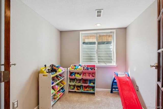 13818 Krameria St, Thornton, CO 80602 - rec room featuring carpet, visible vents, and baseboards
