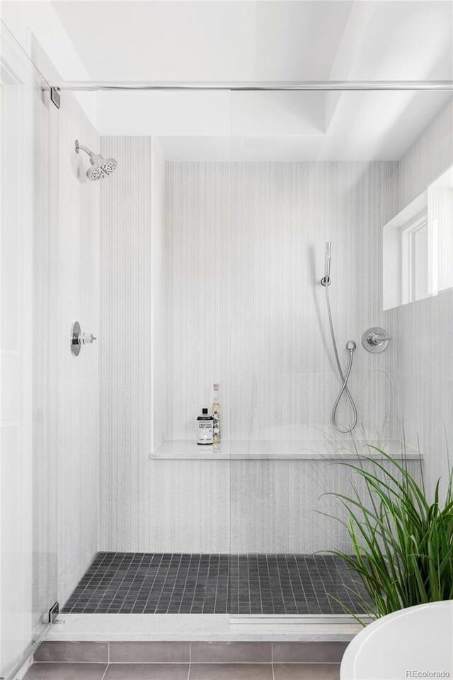 full bathroom with a shower stall