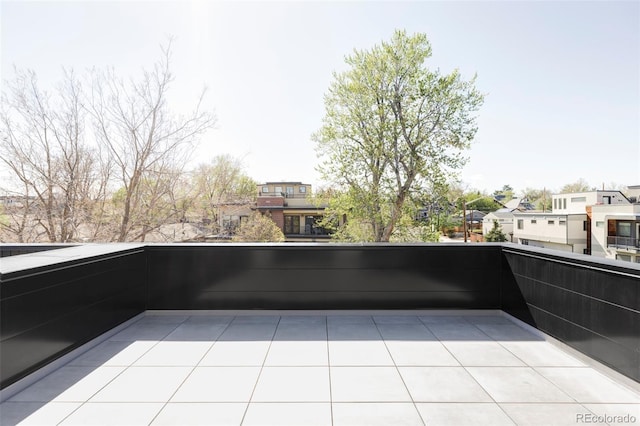 view of patio with a balcony