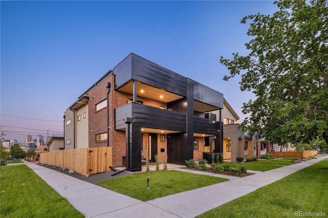 2090 Eliot St, Denver, CO 80211 - modern home with brick siding and a balcony
