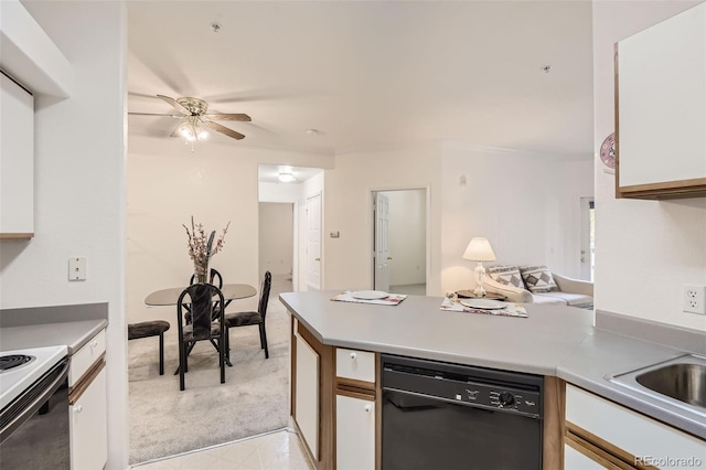 kitchen with dishwasher, light carpet, ceiling fan, and white cabinets