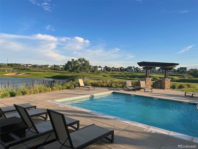 community pool featuring a patio area