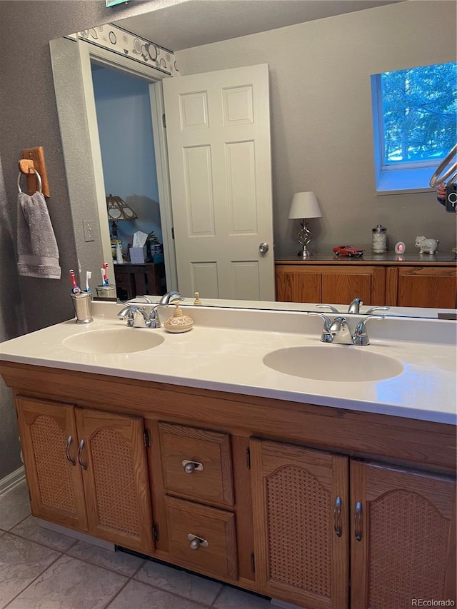 bathroom featuring vanity and tile patterned floors