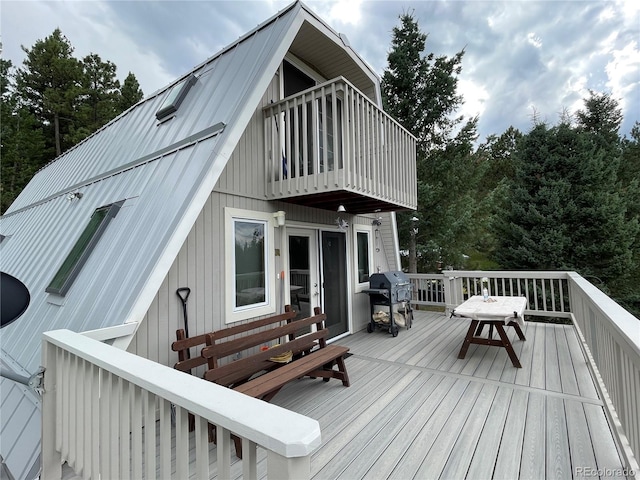 wooden deck with area for grilling