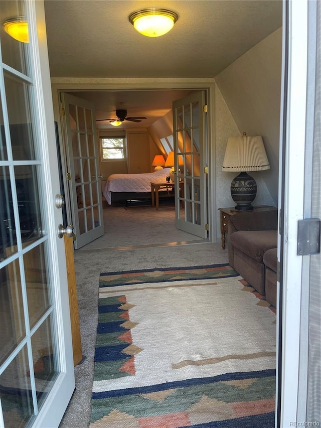 exterior space featuring vaulted ceiling and french doors