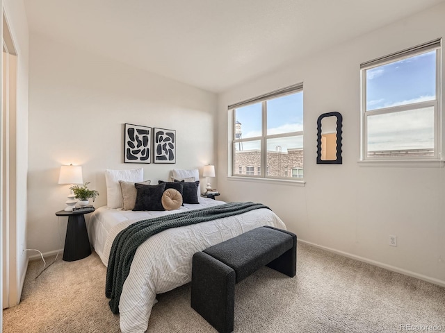 5467 Zephyr Ct Unit 5467, Arvada, CO 80002 - bedroom with light colored carpet and baseboards
