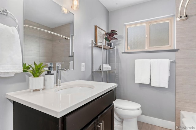 bathroom with a bath, walk in shower, toilet, and vanity