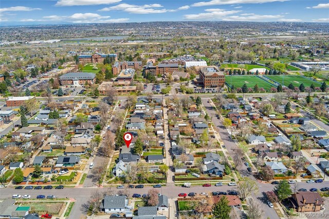 birds eye view of property with a residential view