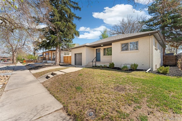 ranch-style home featuring a front lawn, driveway, fence, a garage, and brick siding