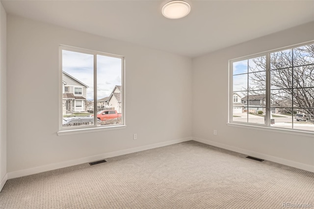15870 Duckweed Ct, Parker, CO 80134 - empty room with visible vents, carpet flooring, and baseboards