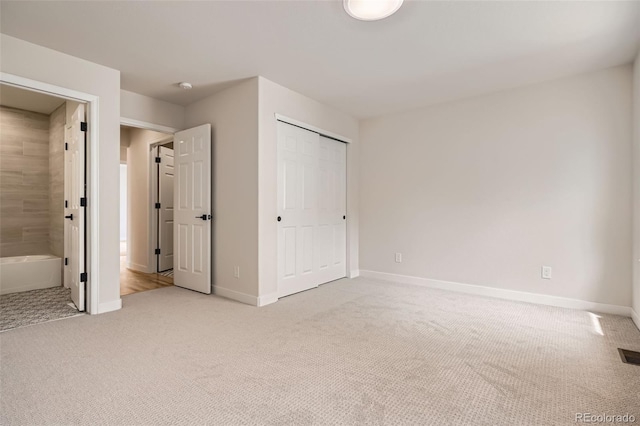 15870 Duckweed Ct, Parker, CO 80134 - unfurnished bedroom with baseboards, a closet, and light carpet