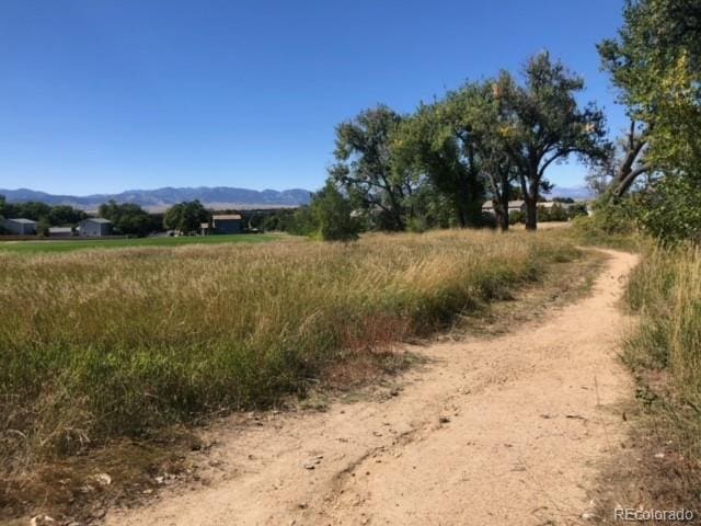 view of street featuring a mountain view and a rural view