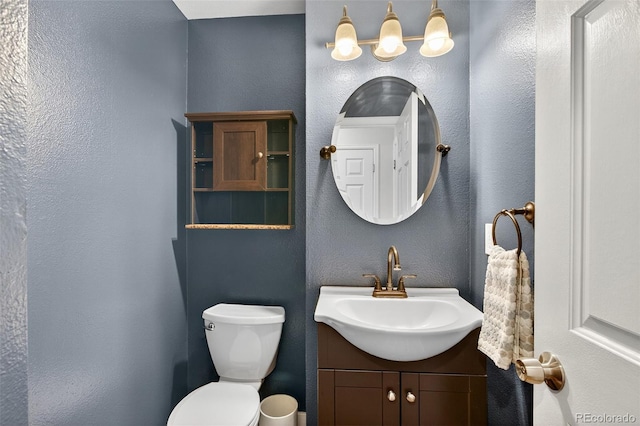 8269 S Gaylord Cir, Centennial, CO 80122 - half bath featuring a textured wall and vanity