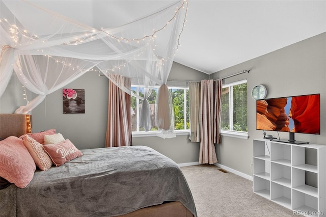 8269 S Gaylord Cir, Centennial, CO 80122 - carpeted bedroom with vaulted ceiling and baseboards