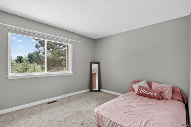 8269 S Gaylord Cir, Centennial, CO 80122 - carpeted bedroom with baseboards