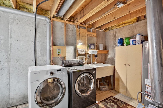 8269 S Gaylord Cir, Centennial, CO 80122 - laundry area with washer and dryer and water heater