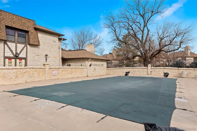 community pool with fence