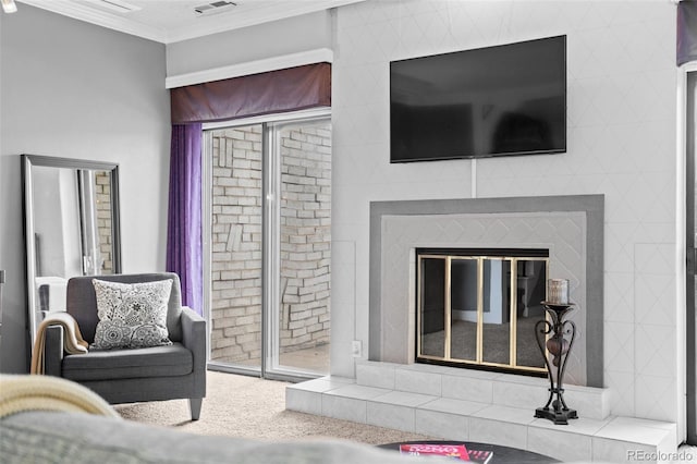 living room featuring ornamental molding, carpet, and visible vents