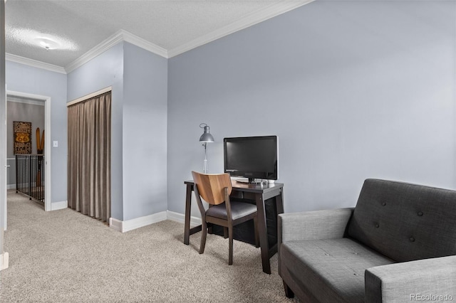 carpeted home office with baseboards, ornamental molding, and a textured ceiling