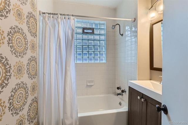 bathroom featuring shower / bath combination with curtain and vanity