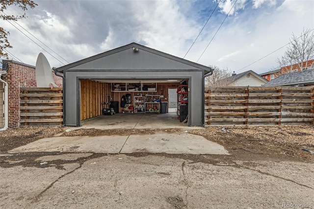 detached garage with fence