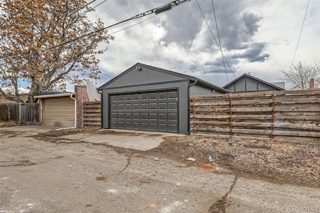 garage with fence