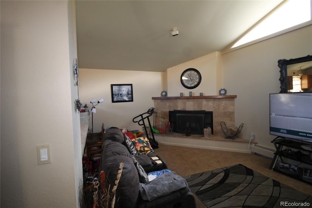 living room with carpet floors, a tiled fireplace, baseboard heating, and lofted ceiling