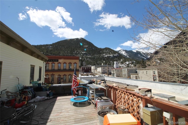 wooden terrace with a mountain view