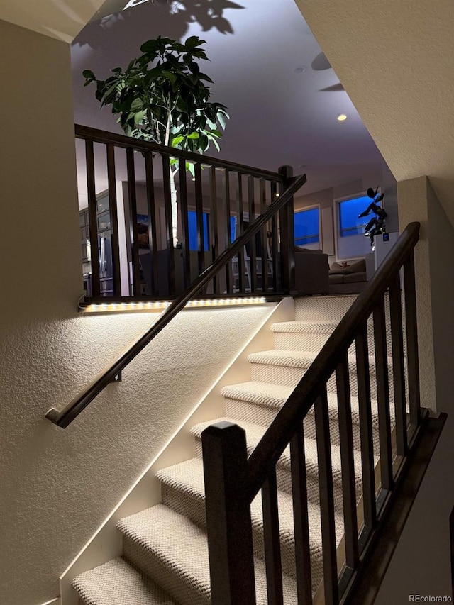 4526 Colorado River Dr, Firestone, CO 80504 - staircase featuring a textured wall