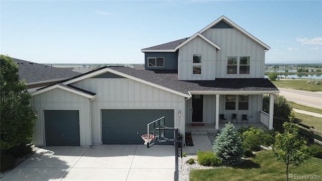 4526 Colorado River Dr, Firestone, CO 80504 - modern farmhouse featuring a shingled roof, an attached garage, board and batten siding, a porch, and driveway