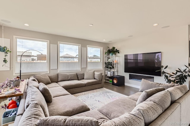 4526 Colorado River Dr, Firestone, CO 80504 - living room featuring wood finished floors, recessed lighting, and baseboards