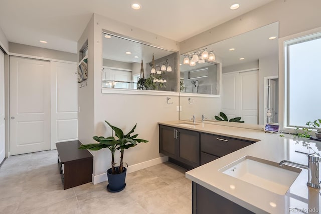 4526 Colorado River Dr, Firestone, CO 80504 - bathroom featuring vanity, plenty of natural light, recessed lighting, and baseboards