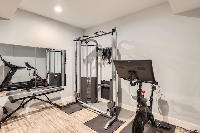4526 Colorado River Dr, Firestone, CO 80504 - exercise room with baseboards and wood finished floors