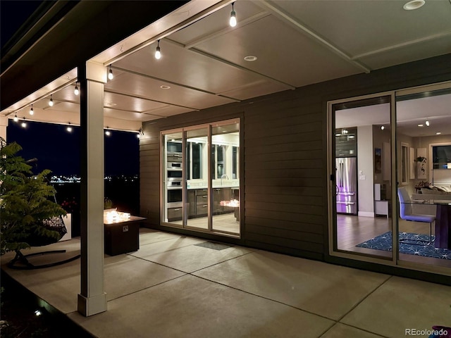 4526 Colorado River Dr, Firestone, CO 80504 - view of patio featuring a fire pit