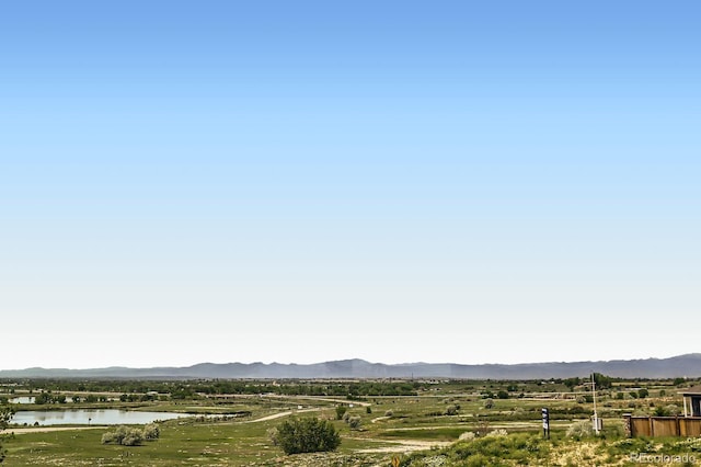 4526 Colorado River Dr, Firestone, CO 80504 - view of mountain background with a nearby body of water
