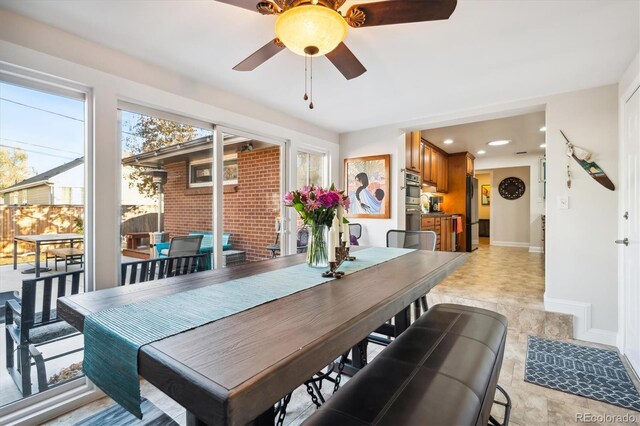 dining area with ceiling fan