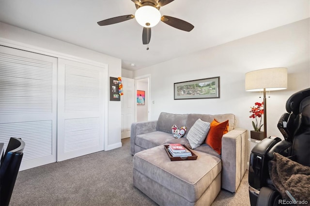 living room featuring light colored carpet and ceiling fan