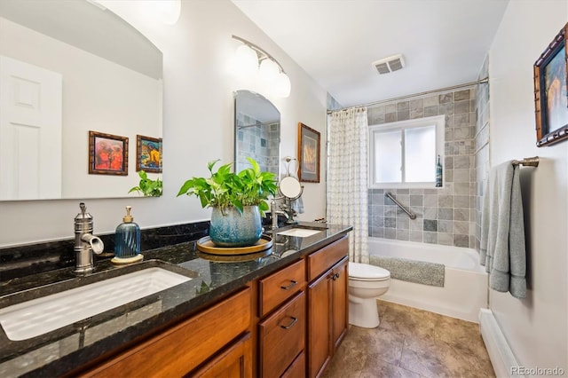 full bathroom with vanity, toilet, and shower / bath combo