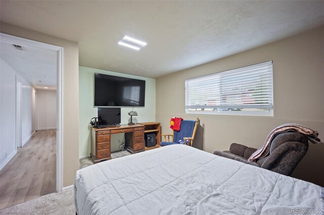 7118 Metropolitan St, Colorado Springs, CO 80911 - bedroom featuring baseboards and visible vents