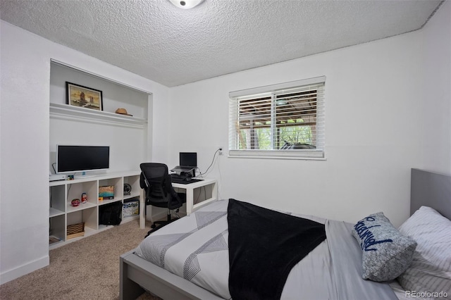7118 Metropolitan St, Colorado Springs, CO 80911 - carpeted bedroom with a textured ceiling