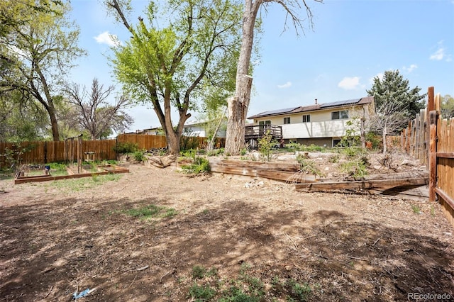 7118 Metropolitan St, Colorado Springs, CO 80911 - view of yard featuring a fenced backyard and a deck
