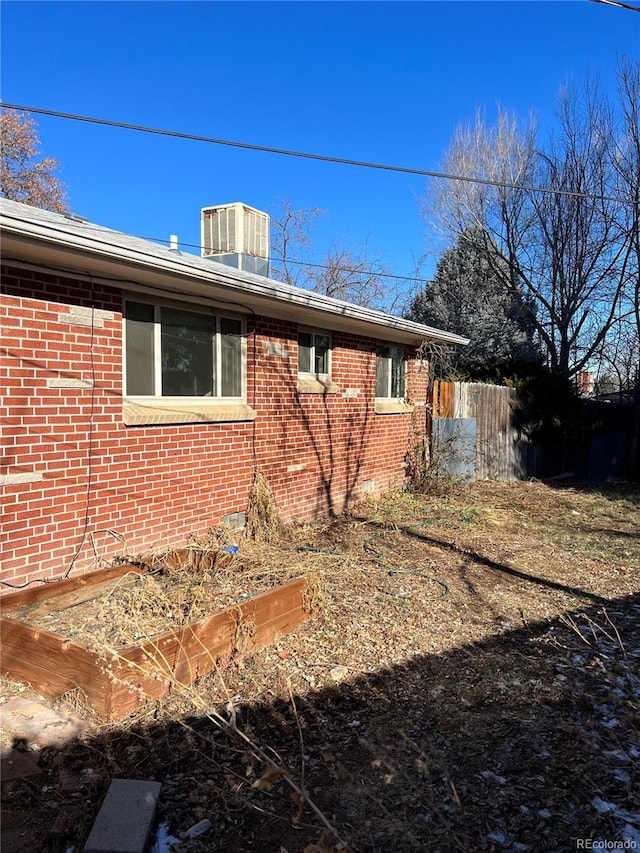 view of property exterior featuring central air condition unit