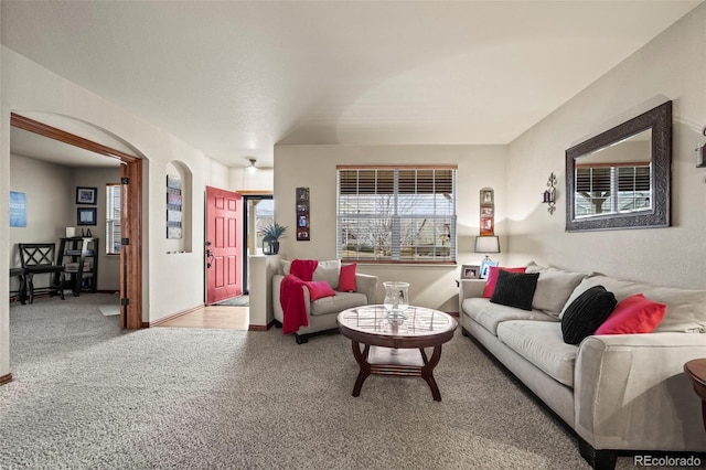 living room featuring light carpet